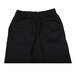 A close up of Chef Revival black chef pants with side pockets.