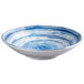 An Elite Global Solutions Van Gogh navy melamine bowl with a swirl design in blue and white.