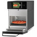 A pizza cooking in an ACP XpressChef 3i high-speed oven.