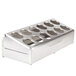 A silver stainless steel flatware organizer with 12 holes.