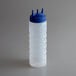 A clear plastic Vollrath Tri Tip squeeze bottle with a blue cap.