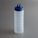 A clear plastic Vollrath squeeze bottle with twin blue tips.