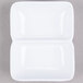 A white rectangular object with two compartments.