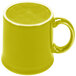 A close-up of a yellow Fiesta Java Mug with a handle.