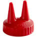 A red plastic cone with two pointy tips.