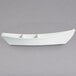A white boat shaped dish with dividers.