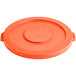 An orange plastic round Lavex commercial trash can lid.