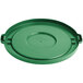 A green plastic lid for a circular Lavex commercial trash can.