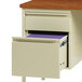 A Hirsh Industries putty and oak right corner pedestal desk with an open file drawer.
