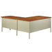 A Hirsh Industries right corner pedestal desk with a wooden top and two drawers.