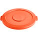 An orange plastic Lavex lid for a round trash can.