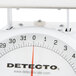 A Cardinal Detecto PT-2R portion scale with a white background and a red rotating dial.