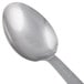 A close-up of the American Metalcraft hammered stainless steel vintage solid spoon with a silver handle.