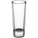 A clear Acopa shot glass with a black rim.