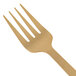 An American Metalcraft hammered gold cold meat fork.
