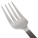 An American Metalcraft stainless steel cold meat fork with a wavy aged design.