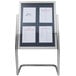 A chrome double pedestal menu board with white paper on it.