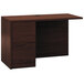 A mahogany HON desk return with drawers.