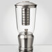A Tablecraft stainless steel and Tritan beverage dispenser with an infuser and ice core.