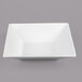 A white square G.E.T. Enterprises deep square bowl with a textured finish.