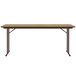 A rectangular Correll Fusion Maple seminar table with off-set metal legs.
