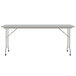 A white rectangular Correll folding table with a gray frame.