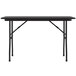 A black Correll rectangular folding table with metal legs.