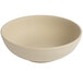 A close-up of a Tuxton Zion matte beige china bowl with an embossed design.