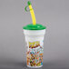 A white plastic "Fun at the Fair" souvenir cup with a green lid and straw.