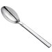A Oneida stainless steel tablespoon with a long silver handle.