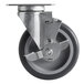 A black and silver 5" swivel caster wheel with brake.