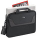 A Solo black polyester laptop briefcase with a laptop inside.