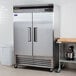A large silver Turbo Air reach-in refrigerator with two solid doors.