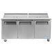 A Turbo Air stainless steel 3 door refrigerated sandwich prep table.
