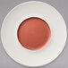 A white Villeroy & Boch porcelain coupe plate with a copper circle in the middle.