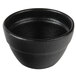 A black bowl with a textured rim on a white background.