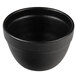 A black G.E.T. Enterprises Bugambilia resin-coated aluminum bowl with a textured finish.