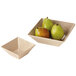 Two square bamboo melamine bowls filled with pears.