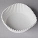 A white paper White Fluted Baking Cup on a white background.