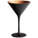 A black martini glass with a copper rim and stem.