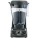 A Vitamix 5201 XL commercial blender with a black base and clear container on a counter.