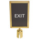 A white sign with the word "exit" in a black frame with gold accents.