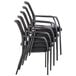 A stack of four Alera black mesh guest chairs with arms.