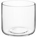A clear glass Acopa Spanish Style double rocks glass with a round bottom.