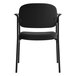 A black HON Basyx guest chair with metal legs and black cushion.