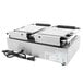 A Globe commercial double sandwich grill machine with smooth plates and a cord.