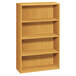 A wooden HON bookcase with four shelves.