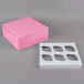 A pink Baker's Mark cupcake box with a white reversible insert with six slots.