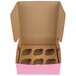 A pink Baker's Mark cardboard box with a 6 slot reversible insert inside.