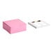A pink cardboard cupcake or muffin box with a separate white reversible insert featuring six slots.
